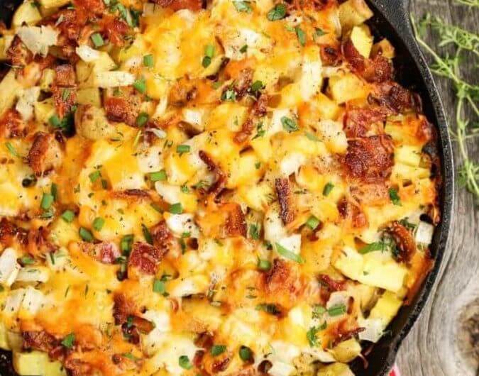 Cheesy Grilled Skillet Potatoes with Bacon and Herbs